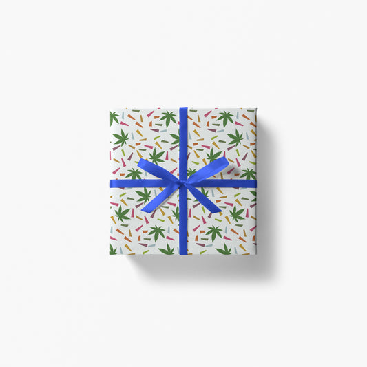 box with blue laced bow wrapped in planta party paper gift wrap by fntsma